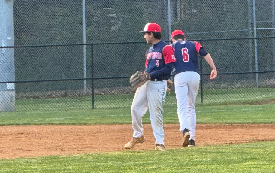 Second base Senior Krish Malik and junior shortstop Marcus Nance prepare for the upcoming game against Hayfield after losing their last three games. “You just have to look on the bright side and you know, just have fun on the field,” Malik said.