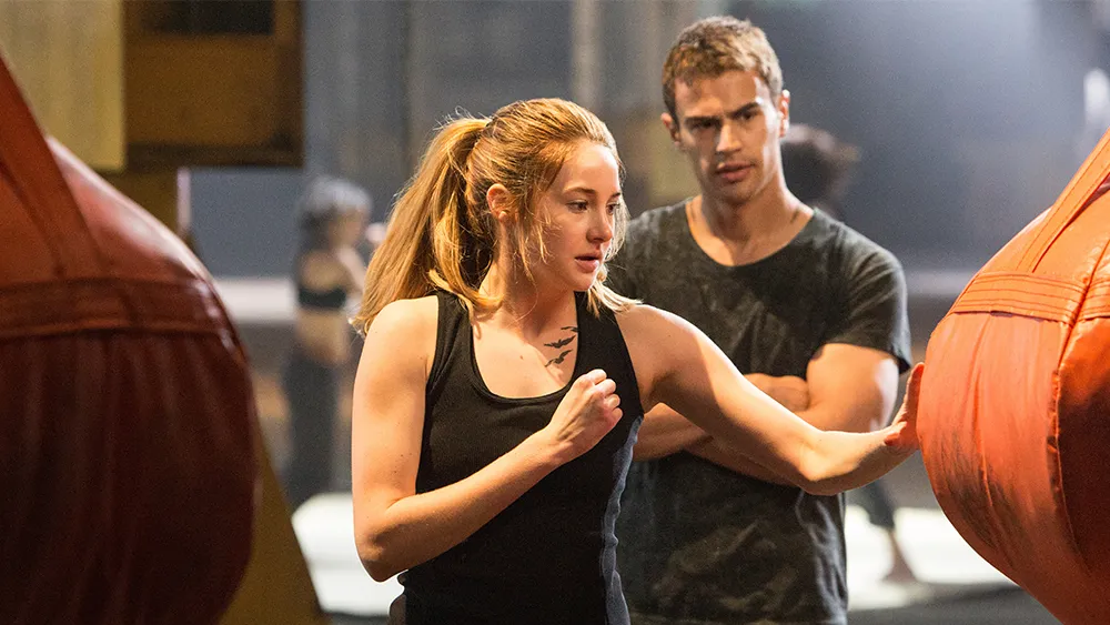 Theo James and Shailene Woodley portray Four and Tris in Veronica Roths bestselling novel, Divergent, film adaptation.