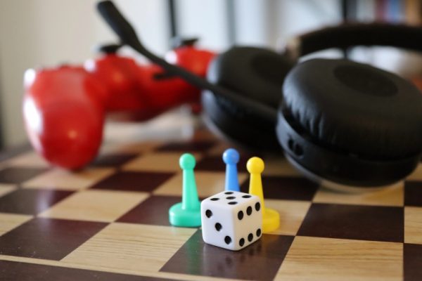 Players around the world enjoy both board games and video games.