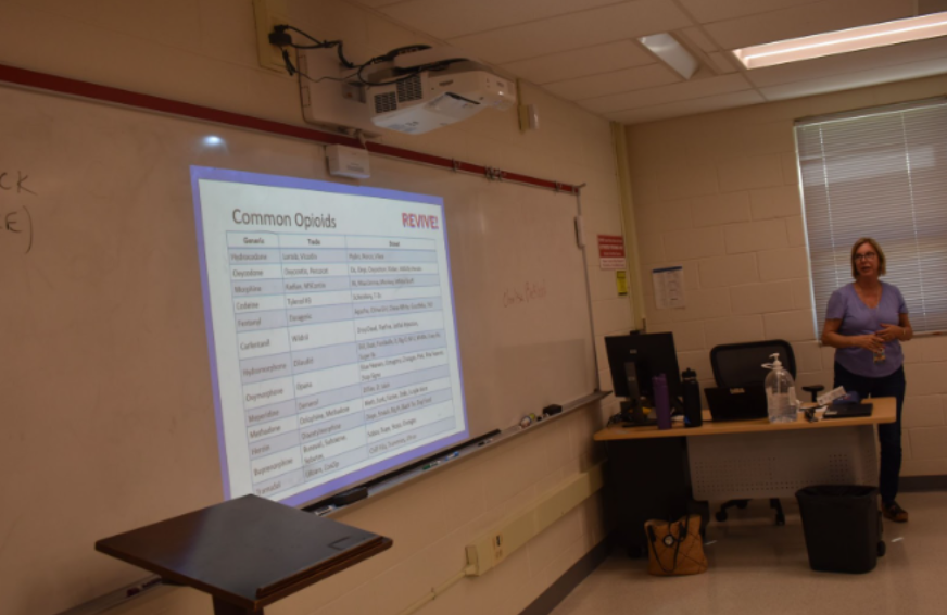 Charlisa Becklund, a substance abuse prevention specialist at Annandale High School, presents common opioids. Becklund’s presentation took place on May 31, and was part of REVIVE, a pilot Narcan administration training for high school students. “The training was very successful,” assistant principal Chrystal Benson said.
