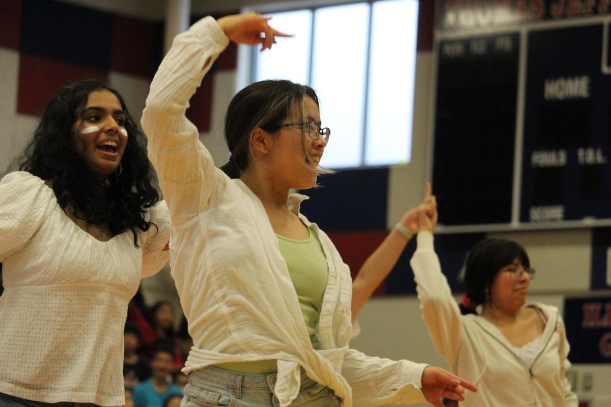 The sophomore MEX dancers gather together after finishing their performance. “Overall, I think MEX was a great success,” sophomore choreographer Grace Yuan said. “I loved the experience.” 