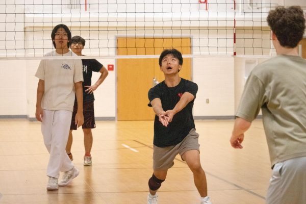 Tony Wang, a sophomore on the boys volleyball team, enjoys playing volleyball. He played on an unofficial team before, which is where he learned most of the skills. “I like being able to be around other guys who like volleyball too,” Wang said. “We all enjoy the sport and volleyball is just fun and exciting to play. It’s cool when we get to hit the ball and make cool plays.” 