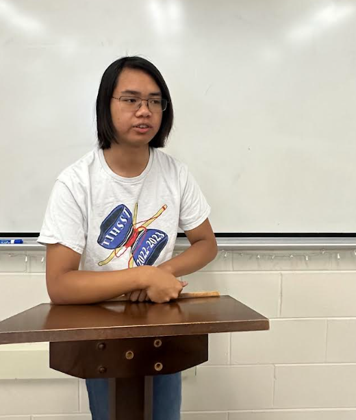 Talking behind the podium to Young Democrats, senior Bryan Nguyen presents about the results of the current election. “Our clubs are mainly focused on getting the word out about just the top issues at hand,” Nguyen said.