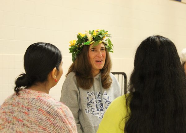 Principal Ann Bonitatibus speaks to two students during her 8th period celebration. “She’s the best principal I’ve ever had, so I’m gonna miss her. I’m happy people got a chance to share,” Assistant Principal Volita Russell said. 