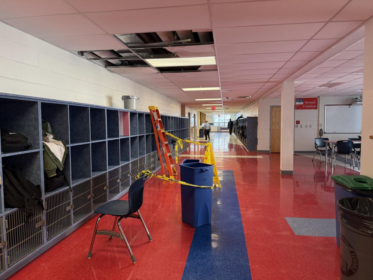 Following a pipe burst, and subsequent ceiling collapse and flooding yesterday, the hallway beside Newton Commons remains partially closed off on Jan. 24. “The leak [that] morning was fixed,” Director of Student Activities David Arthur said. “And then, probably around 11:15 a.m., the pipe completely broke, and that's where [water] started coming down.” 