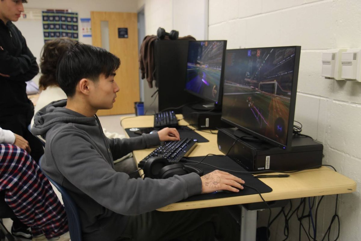 The “Rocket League” team practices in Oct. “For ‘Rocket League,’ we have matches every Thursday, so we will stay after school,” senior Brian Ho said. “We have computers, keyboards and headsets that the school bought for us.”