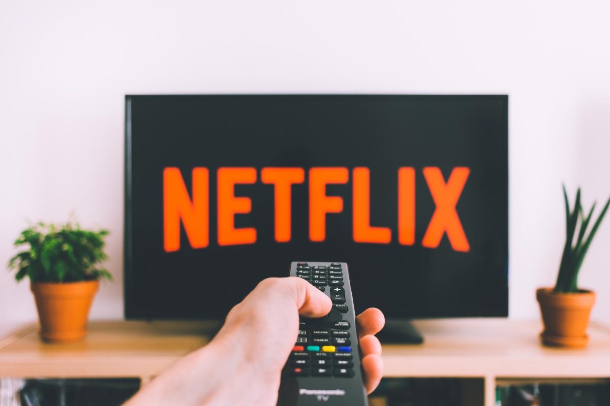 A streaming service consumer sits down to watch Netflix, one of the leading streaming services in the the world.