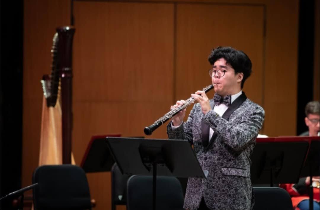 Senior oboist Daniel Yeum performs with the Marine Band. “To be honest, you have to lose sleep to balance [music and school]. I go to the basement so I don't wake my parents up, and my practice sessions are usually around 12 a.m. to 2 a.m.” 